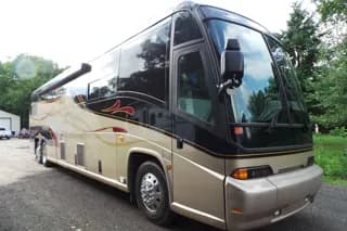 2000 Motor Coach Industries 102EL3 bus