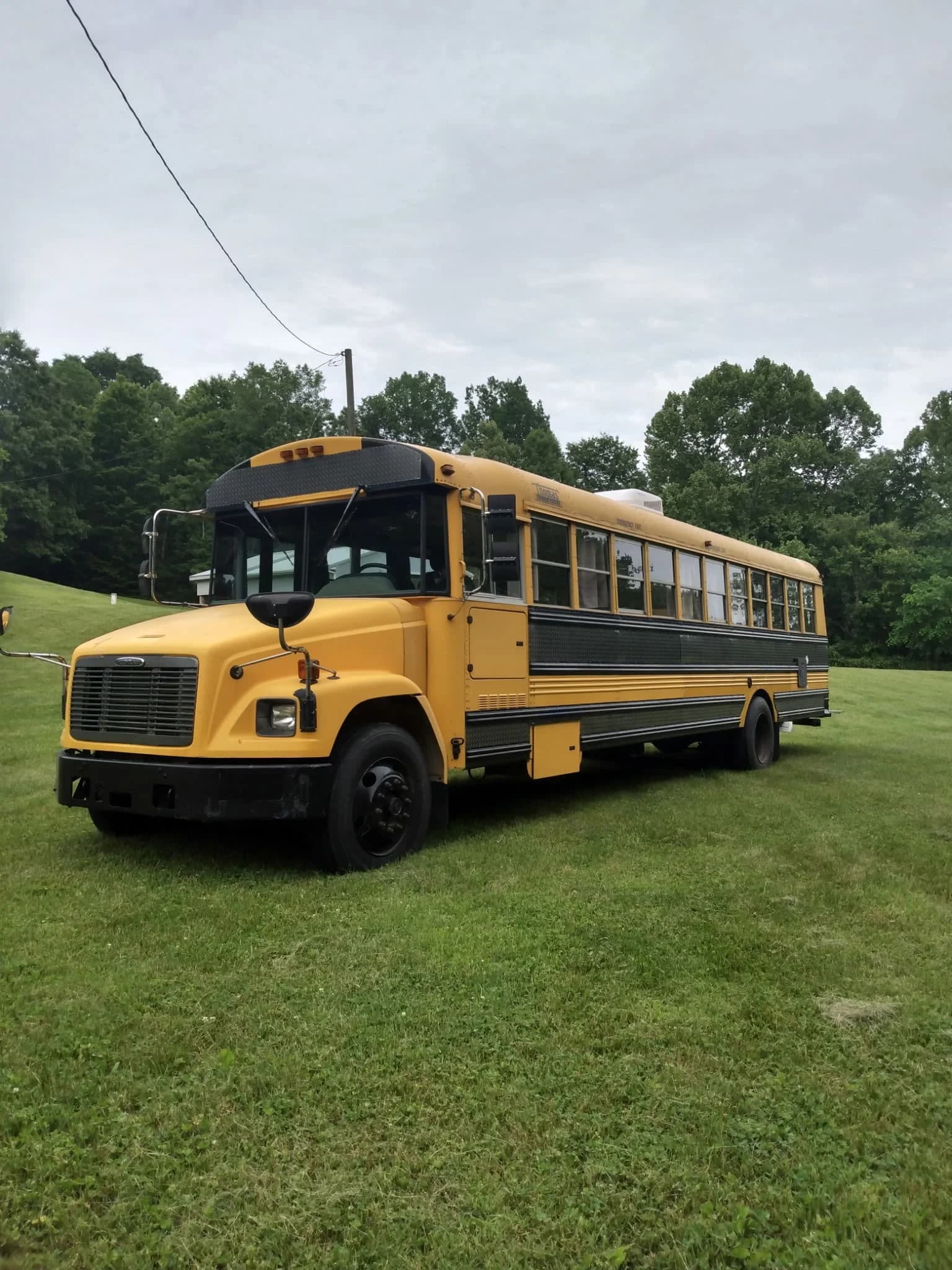 2004 Freightliner FS65 Skoolie Conversion - Image 1