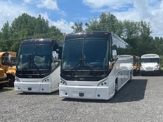 Twin 2025 MCI J4500 ADA Buses - Image 1