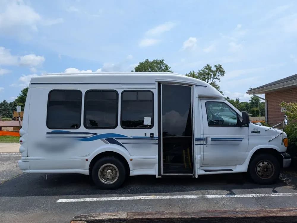 E-350 14 Passenger Shuttle Bus #25447 - Image 1
