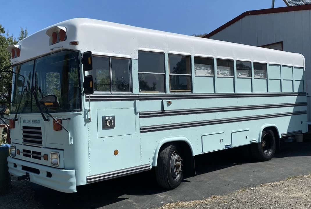1999 Blue Bird TC1000 Skoolie Conversion - Image 1