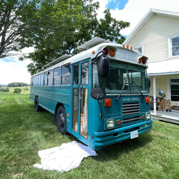 2003 Blue Bird TC2000 Skoolie Conversion - Image 1