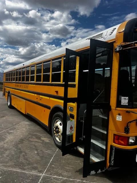  2 matching 2014 International school buses - Image 1