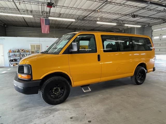 2013 GMC 9 Passenger School Van - Image 1