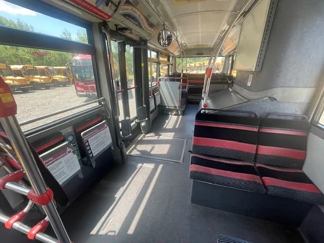 Two Twin Van Hool 30 Foot Transit Buses - Image 32